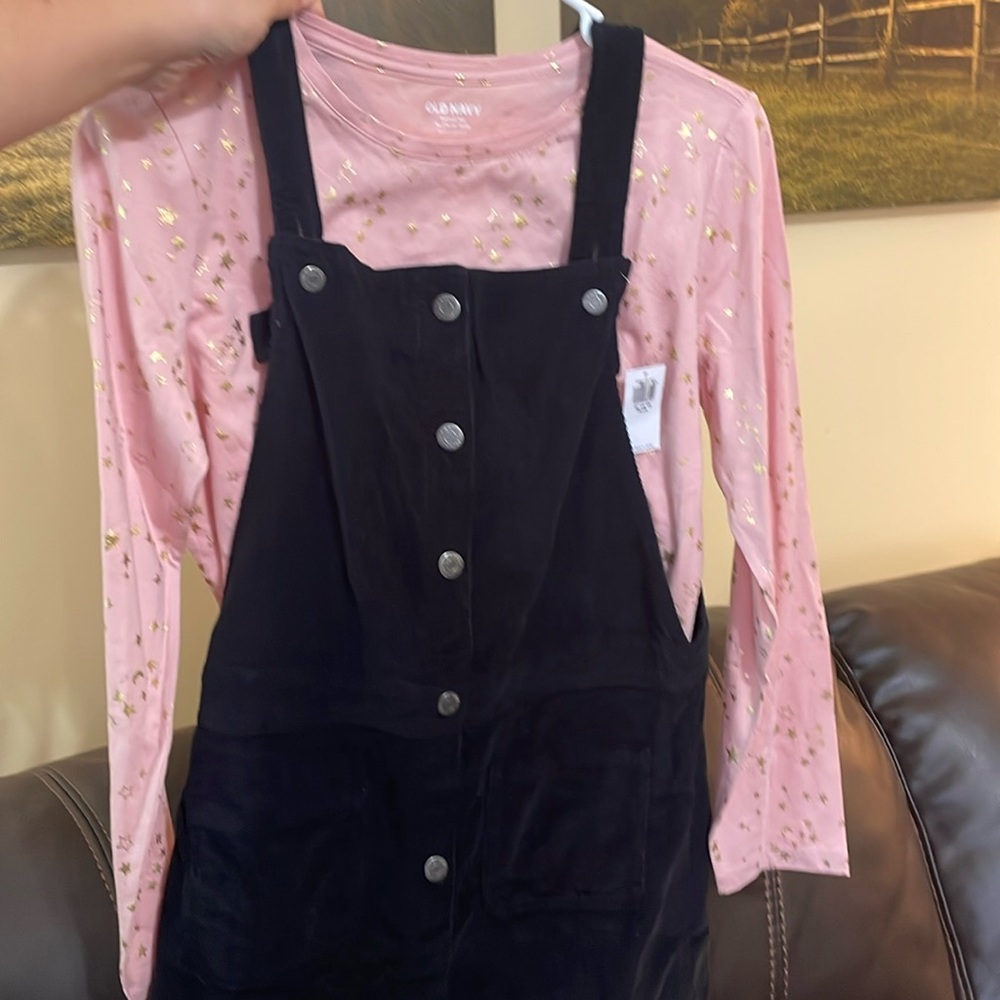 This is a Old Navy, corduroy, black jumper dress with long sleeve undershirt